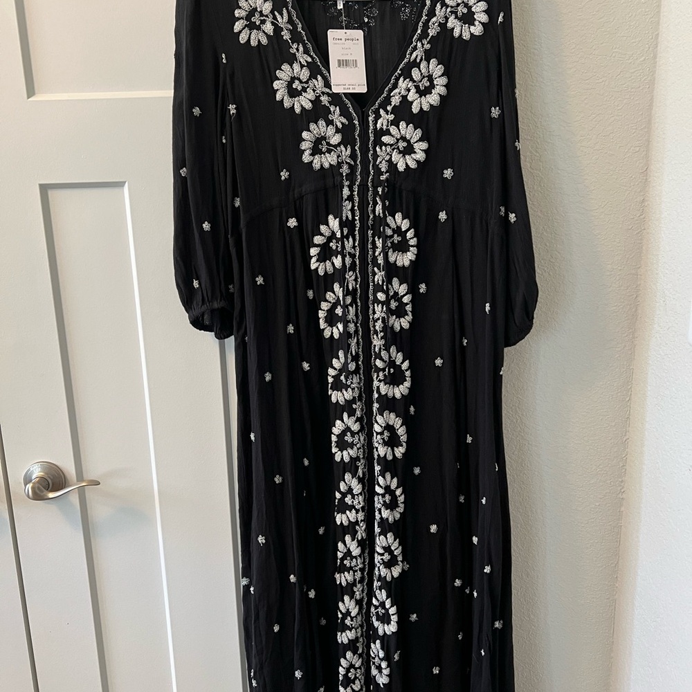 NWT  Free People dress. Size medium. Black.